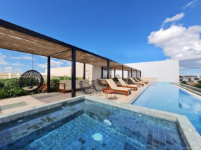 Big Studio at KAAB BY THE BEACH with roof top pool, sauna and Jacuzzi near Paseo del Carmen Mall